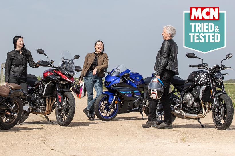 Lady riders chatting with their bikes