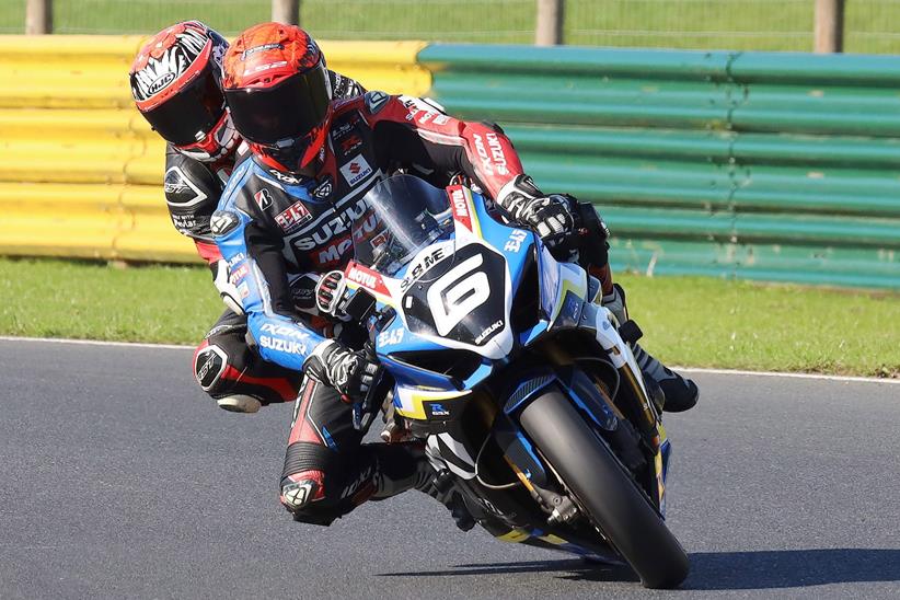 Cornering on track with a pillion passenger