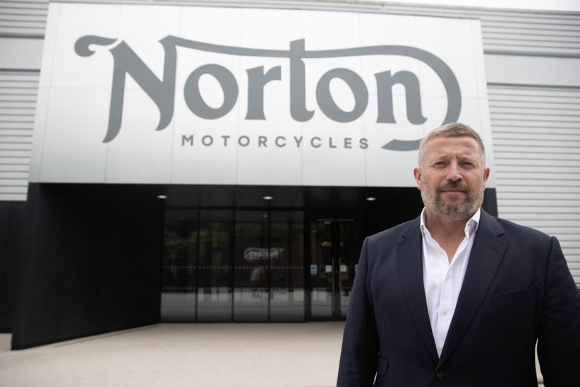Richard Arnold, stood outside Norton HQ