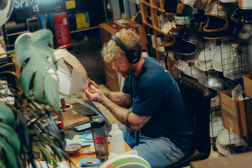 Hedon worker prepping helmet
