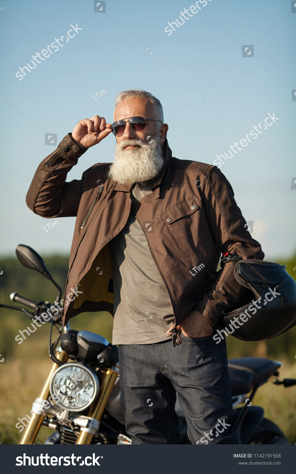 Old Rider Biker Man Black Leather Stock Photo (Edit Now) 1142191568